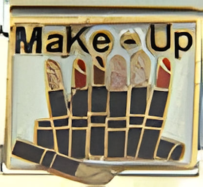 Make-Up Text with Tubes of Lipstick