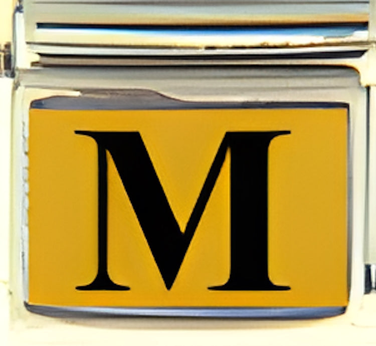 Black Times Letter M with Gold Colored Background Photo Charm